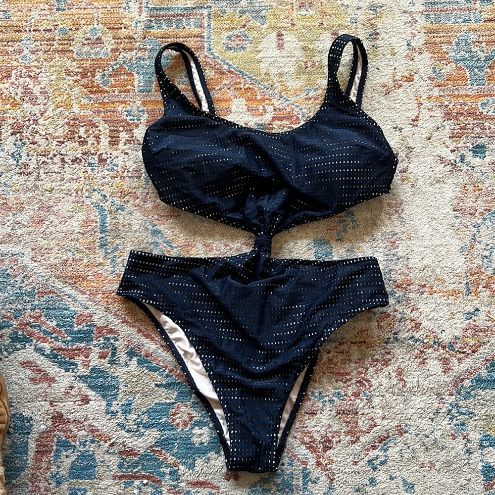 Worn once cut out one piece.